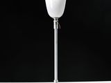 a close up of a lamp on a table with a black background