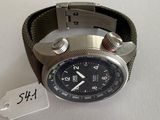 a watch that is sitting on a table with a price tag