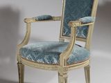 an image of a chair with a blue upholstered upholstered seat