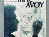 an old book with a drawing of a man ' s face on it