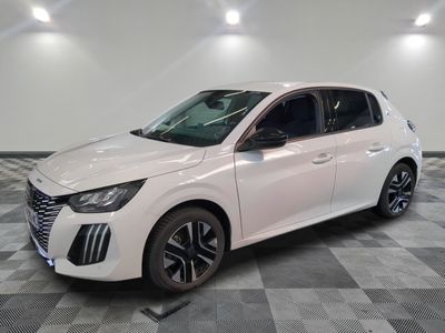 the white car is parked on a checkered floor in a room