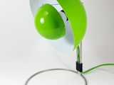 lime green table lamp with a white base and a black cord