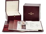 an image of a box with a watch inside of it on a white surface