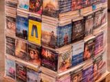 a stack of dvds stacked on top of a pallet
