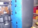 an image of a kitchen with a blue refrigerator