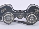 a pair of binoculars that are sitting on a table