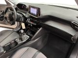 the interior of a car with a steering wheel, dashboard, and dashboard controls