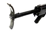 a machine gun that is attached to the side of a pole