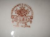 a close up of a plate with a logo on it