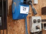 a picture of a garage with a lot of tools on the wall