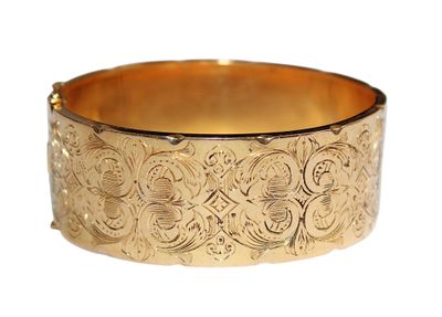 BRACELET manchette rigide et ouvrant en or 750/1000, entière…