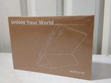 packaging for a tablet computer sitting on top of a white table