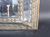 a picture of a mirror that is sitting on a table