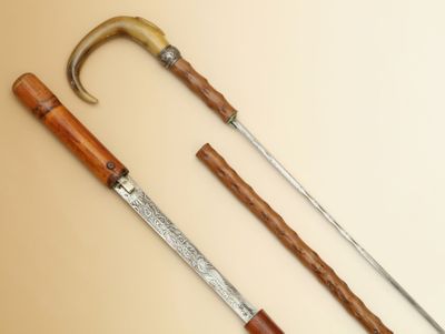 2 CANNES à système "épée" - L'une en rotin Pommeau dévoilant… - Photo 1