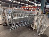 many carts that are sitting in a large warehouse