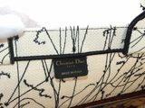 a close up of a purse with a label on it