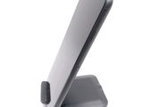 a cell phone that is sitting on top of a stand