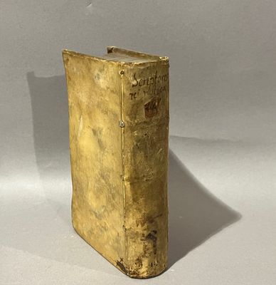 an old book that is sitting on a table