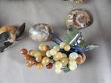 a bunch of grapes and other items on a table