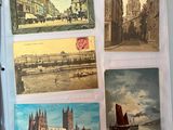a book with pictures of buildings and boats on it