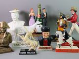many figurines of different types and sizes on display