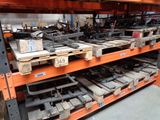 many different types of tools on the shelves in the warehouse