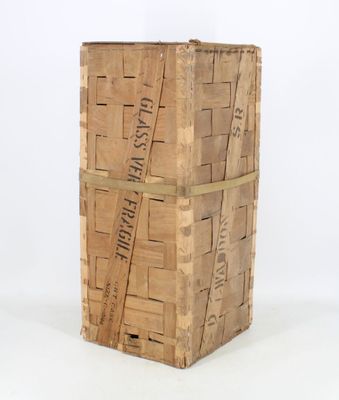 a large wooden box with a label on it