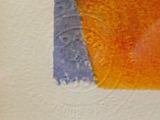 a painting of an orange and blue square on a piece of paper