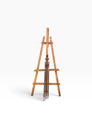 an image of a wooden easel on a white background