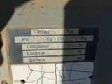 a sign on the side of a building telling where to go