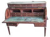 a wooden desk with a marble top and drawers