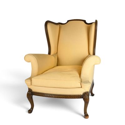an image of a chair with a yellow upholstered upholstered back