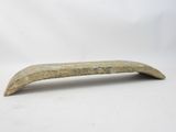 an old wooden spoon with a curved handle on a white background