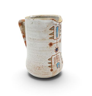 an image of a white pitcher with a design on it