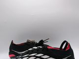 a close up of a pair of soccer shoes on a white background