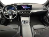 the interior of a bmw vehicle with a touch screen and a steering wheel