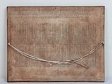 a picture of a piece of old paper with a string wrapped around it