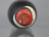 a close up of a bottle of wine on a table