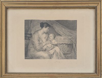 une vieille photo d'une femme tenant un bébé sur ses genoux