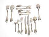 a lot of silverware on a white table