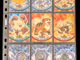 six different pokemon trading cards on a binder