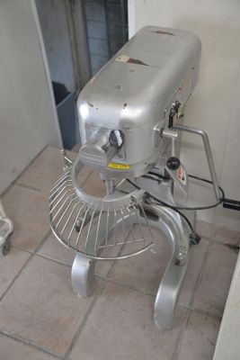 an image of a kitchen with a mixer on the floor