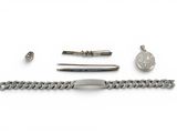 a silver bracelet with a chain and a watch on it
