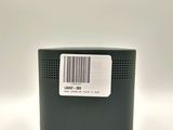 the back of a black speaker with a barcode label on it