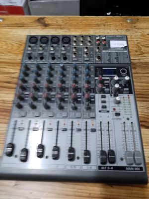 a sound board that is sitting on a wooden table