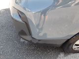 a close up of a car ' s front bumper and fender