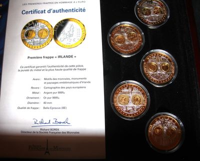 a picture of a certificate of authenticity and authenticity of a coin