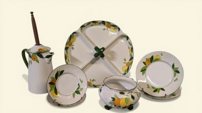 a picture of a table setting with lemons painted on it