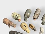 a lot of different animal figurines on a white surface