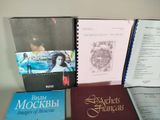 many books that are sitting on top of a table